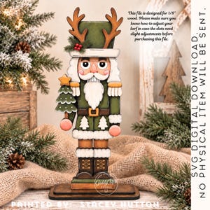 May include: A wooden nutcracker figurine featuring a green uniform with white tree accents, a tall hat with brown antlers, and a small green tree held in one hand. The text states: This file is designed for 1/8" wood. SVG DIGITAL DOWNLOAD. NO PHYSICAL ITEM WILL BE SENT.