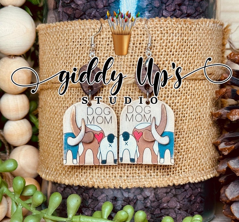 Show off your love for your furry best friend with these adorable Dog Mom Earring SVG Files! This digital download allows you to create your own custom earrings to showcase your bond with your beloved pup. intended for glowforge laser cut file