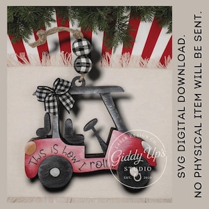 May include: A wooden golf cart ornament with a red and black color scheme. The ornament has a black and white checkered bow and two checkered beads. Text on the ornament reads "This is how I roll".