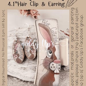May include: A set of Easter bunny themed hair clips and earrings. The hair clip features a painted bunny with the text "Peter Cottontail". The earrings are small and feature a painted bunny with the text "Bunnies".