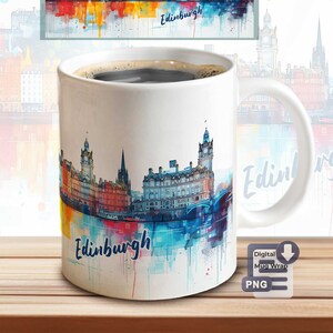 May include: A white ceramic mug with a watercolor design of the Edinburgh skyline. The design features a colorful cityscape with a blue river and the word "Edinburgh" written in a stylized font.