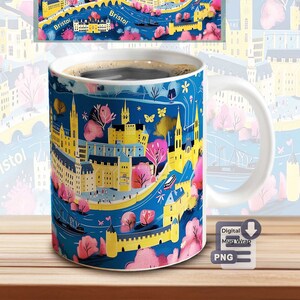 May include: A white ceramic mug with a colorful illustration of a city skyline. The illustration features buildings, trees, and a river. The text "Bristol" appears multiple times on the mug.