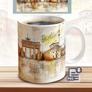 May include: White ceramic coffee mug featuring a watercolor illustration of Berlin landmarks, including the Brandenburg Gate and the Berlin TV Tower. The word "Berlin" is written in a stylized font. The mug is filled with dark coffee.