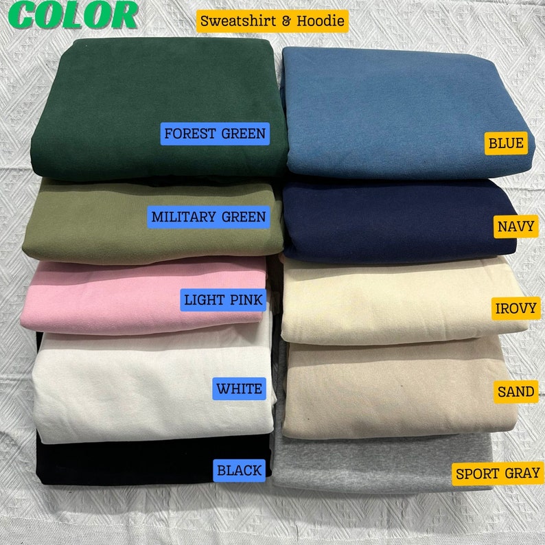 Puede incluir: Una exhibici&oacute;n de sudaderas y sudaderas con capucha dobladas en varios colores. Los colores incluyen verde bosque, azul, verde militar, marino, rosa claro, marfil, blanco, arena, negro y gris deportivo. El texto "COLOR" y "Sweatshirt & Hoodie" son visibles.