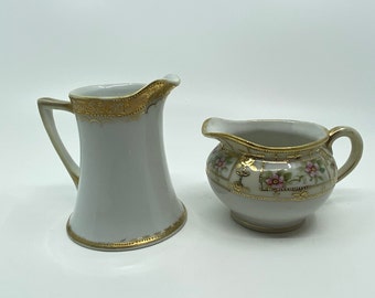 Two Nippon Creamers Both with Gold embellishment