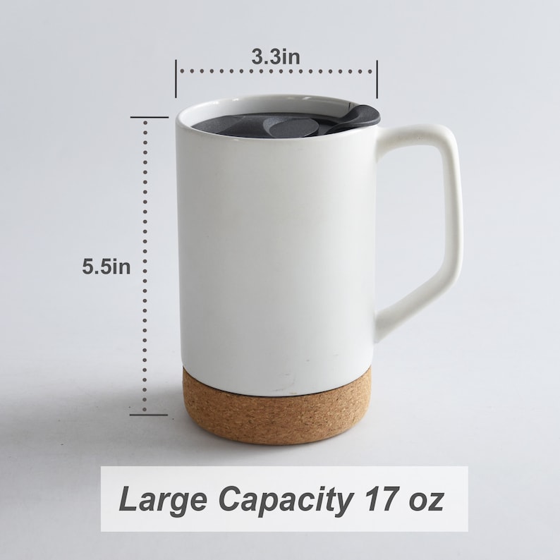 May include: White ceramic mug with a cork base and a black lid. The mug has a handle and measures 5.5 inches tall and 3.3 inches wide. It has a capacity of 17 ounces.  Large Capacity 17 oz