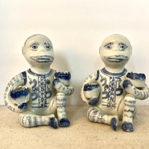 Vintage Accent Pair of Blue and White Monkey Lotus Candle Figurines