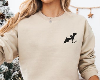 Sudadera con dragón bordado: regalo para gamers y amantes de la lectura.