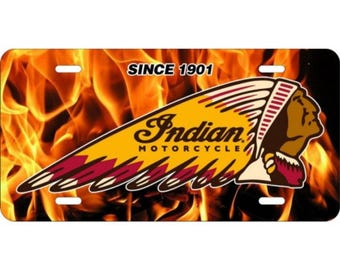 May include: A yellow, red, and black Indian Motorcycle license plate with flames in the background. The text "SINCE 1901" and the Indian Motorcycle logo are visible.