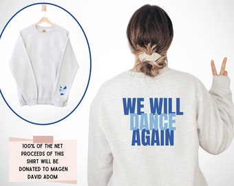 Könnte beinhalten: Grauer Sweatshirt mit dem Text "WE WILL DANCE AGAIN" in Blau und Hellblau auf der Rückseite. 100% des Nettoerlöses dieses Shirts wird an Magen David Adom gespendet.