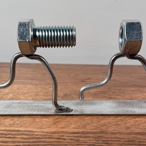 Scrap Metal Bolt Chasing Nut Figurine