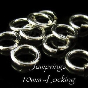 May include: A close-up of ten silver jump rings, each measuring 10mm in diameter. The rings are arranged in a pile, with some overlapping. The text "Jump rings 10mm - Locking" is visible at the bottom of the image.