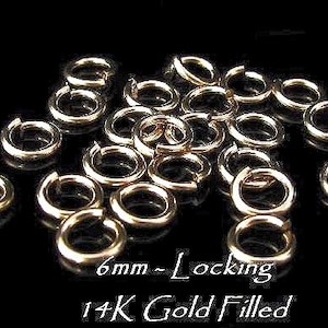 May include: A pile of 6mm gold-filled locking jump rings.  6mm - Locking 14K Gold Filled