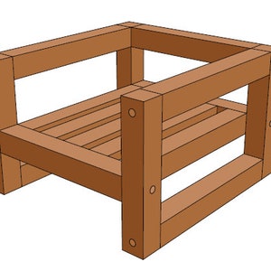 Puede incluir: Un marco de silla de madera con una mancha marr&oacute;n. La silla tiene un dise&ntilde;o simple con un asiento y un respaldo cuadrados.