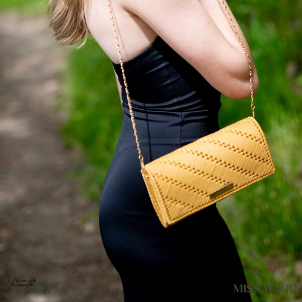 classic clutch bag in the most fashionable mustard color with long gold chain, expensive gift for girl