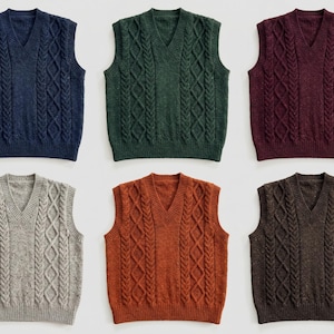 May include: Six cable-knit V-neck sweater vests in various colors: navy blue, green, burgundy, grey, orange, and brown. Each vest features a classic cable-knit design and a ribbed hem.