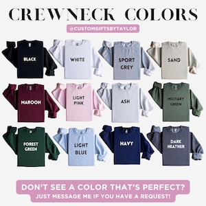 May include: A display of crewneck sweatshirts in various colors, including black, white, sport grey, sand, maroon, light pink, ash, military green, forest green, light blue, navy, and dark heather. Text on the image reads "CREWNECK COLORS" and "DON'T SEE A COLOR THAT'S PERFECT? JUST MESSAGE ME IF YOU HAVE A REQUEST!"