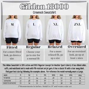 May include: White Gildan 18000 crewneck sweatshirt with size guide. The guide shows fitted, regular, relaxed, and oversized fits. Measurements are in inches. The model is 5'8" and wears a size 10.