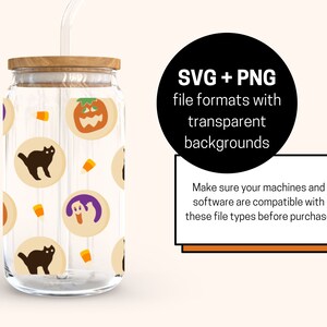 May include: A clear glass tumbler with a wooden lid and a straw. The tumbler has a Halloween-themed design with black cats, pumpkins, and candy corn.