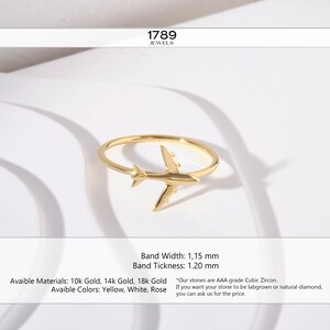 Celebrate your love for adventure with our traveler ring gold, a sleek and meaningful accessory for those always on the move. This stylish airplane ring 14K and Airplane ring gold design is perfect for any female pilot ring or aviation enthusiast. With its minimal plane ring design and elegant 18K stackable ring form, it's ideal for everyday wear. Whether you're looking for something gifted for hostess, travellers jewelry,