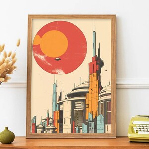 May include: A retro-style poster featuring a futuristic cityscape with tall buildings and a large red sun in the background. The buildings are a mix of colours, including orange, yellow, blue, and red. The poster has a vintage, distressed look.