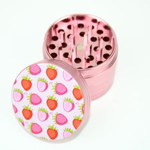 Strawberry Bliss Grind: The Four Piece Grinder Which Comes with Fast USA Shipping