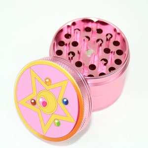 Twinkle Twirl Grind: The Four Piece Grinder Which Comes with Fast USA Shipping