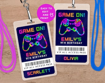May include: Two colourful printable party favour lanyards with a neon green, blue, and red video game controller graphic. The text "Game On!" is at the top of each lanyard. The text "Emily's 9th Birthday" is below the graphic. The text "VIP All Access Pass" is below the birthday text. The name "Scarlett" is at the bottom of the left lanyard. The name "Olivia" is at the bottom of the right lanyard.