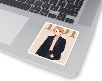 May include: A sticker featuring an anime-style illustration of a person in a black blazer and dark pants. The person is wearing a necklace and has blonde hair. The sticker has the text "TOT" in a gold color.