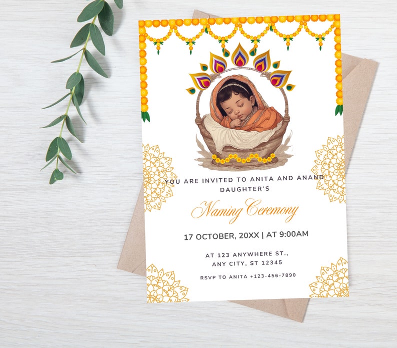 May include: A white invitation card with gold accents and a floral design. The card announces a Naming Ceremony for a baby girl. The text reads "You are invited to Anita and Anand's daughter's Naming Ceremony. 17 October, 20XX | At 9:00 AM. At 123 Anywhere St., Any City, ST 12345. RSVP to Anita +123-456-7890."