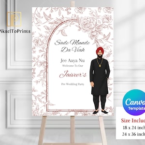 May include: A wedding welcome sign on an easel. The sign features floral and botanical designs in a soft brown hue. Text includes "Sade Munde Da Viah" and "Welcome To Our Jaiveer's Pre Wedding Party". The sign is available in 45.7 x 61 cm and 61 x 91.4 cm.