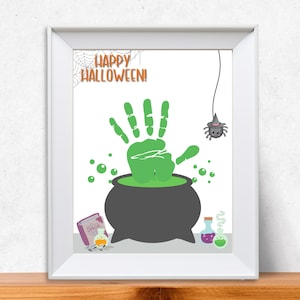 May include: A green handprint in a cauldron with green potion, a spider hanging from the ceiling, and the text "Happy Halloween!" on a white background.