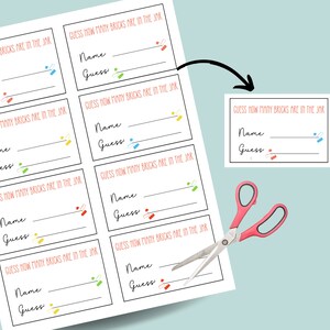 May include: Printable game cards with the text "Guess how many bricks are in the jar" and lines for players to write their names and guesses. The cards are decorated with colorful confetti.
