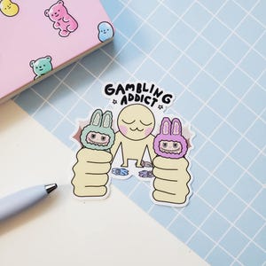 gambling addict glossy vinyl sticker | cute trinket collector, blind box sticker