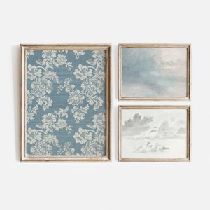 Puede incluir: Tres impresiones enmarcadas en una habitaci&oacute;n blanca. La impresi&oacute;n m&aacute;s a la izquierda presenta un patr&oacute;n floral azul y blanco. La impresi&oacute;n del medio presenta una pintura de acuarela de un cielo nublado. La impresi&oacute;n m&aacute;s a la derecha presenta una pintura de acuarela de un cielo nublado con una vista m&aacute;s detallada de las nubes.
