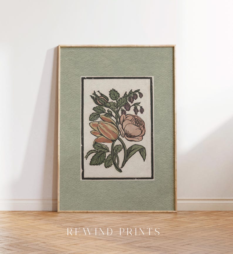 May include: A vintage botanical illustration of a pink rose and other flowers in a green frame. The image is printed on a textured paper with a light green background.
