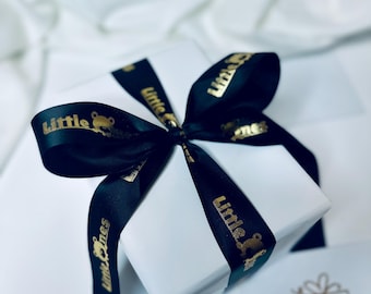 Expert Gift Wrapping: White Paper & Custom Ribbon