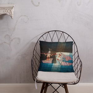 May include: A throw pillow with a colorful illustration of a person in a boat with a long pole, facing a group of fish with large eyes. The background is a dark blue and brown gradient with a light blue and white checkered pattern.