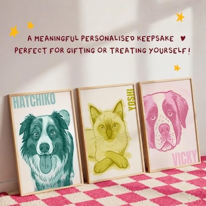 May include: Three framed art prints featuring illustrated pet portraits. The left print shows a teal dog labeled HATCHIKO, the center print shows a yellow cat labeled YOSHI, and the right print shows a pink dog labeled VICKY.