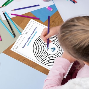 May include: A black and white printable maze activity featuring a penguin and an iceberg. The text reads "Create a path for the penguin to reach the iceberg!"