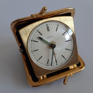 Vintage Mechanical Travel Alarm Clock PETER in a leather wallet