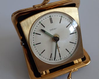 Vintage Mechanischer Reisewecker PETER in einer Leder Geldbörse