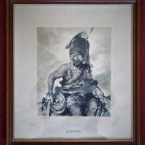 May include: A black and white print of a man in a military uniform with a fur hat and a feathered plume. The print is framed in a brown wooden frame.