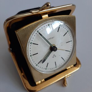 Vintage Mechanical Travel Alarm Clock PETER in a leather wallet