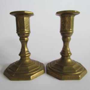 Pair of Bronze vintage candlesticks, height 10.5 cm
