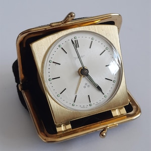 Vintage Mechanical Travel Alarm Clock PETER in a leather wallet