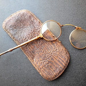 Vintage glasses in a case