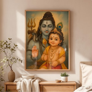 Puede incluir: Una impresión enmarcada que presenta una ilustración religiosa. La obra de arte representa dos figuras, una adulta y un niño, con vestimenta tradicional. La figura adulta tiene piel azul y cabello largo. La figura del niño está adornada con joyas y una pluma de pavo real.