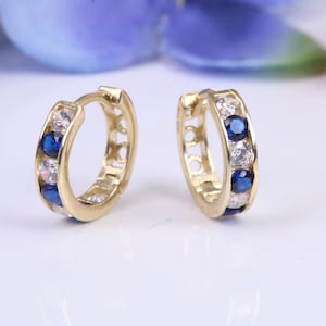 10 mm round hinged hoop earrings, made from solid yellow gold and set with Sapphire and Diamond Cubic Zirconia