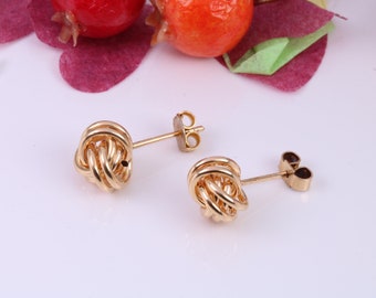 Pendientes de pernos redondos anudados de 10 mm hechos de oro amarillo macizo de 9 quilates, distintivo británico